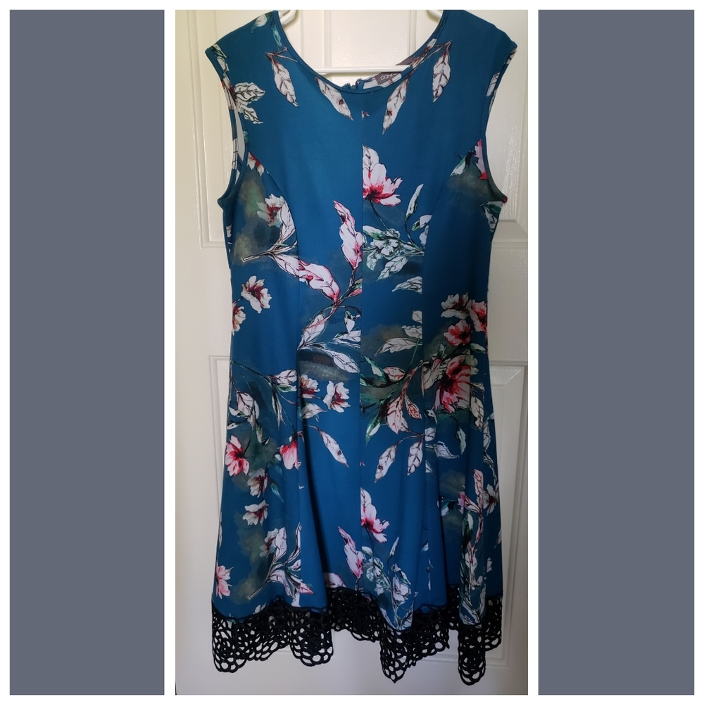 Sleeveless turquoise floral scuba dress with lace hem embellishment